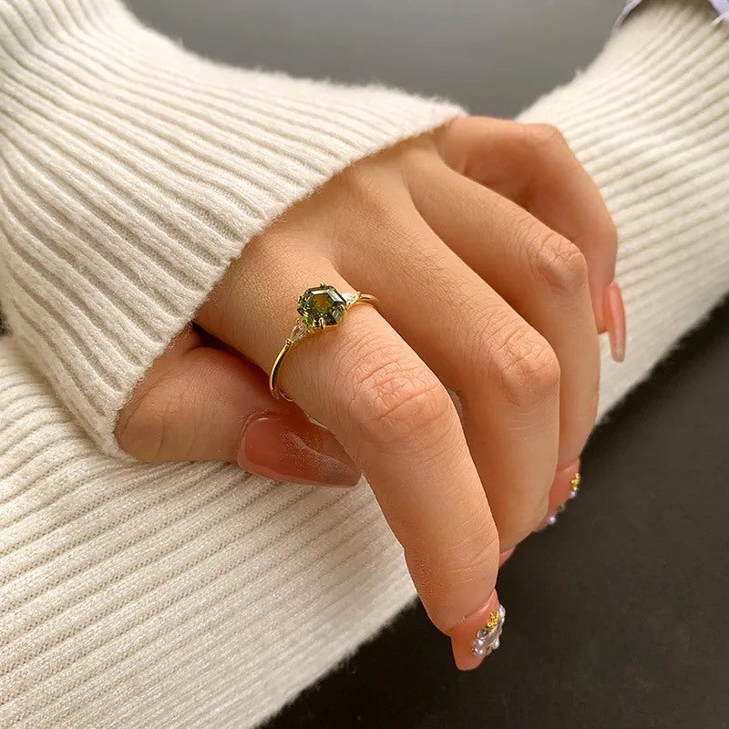 green stone solitaire ring gold plated elegant design