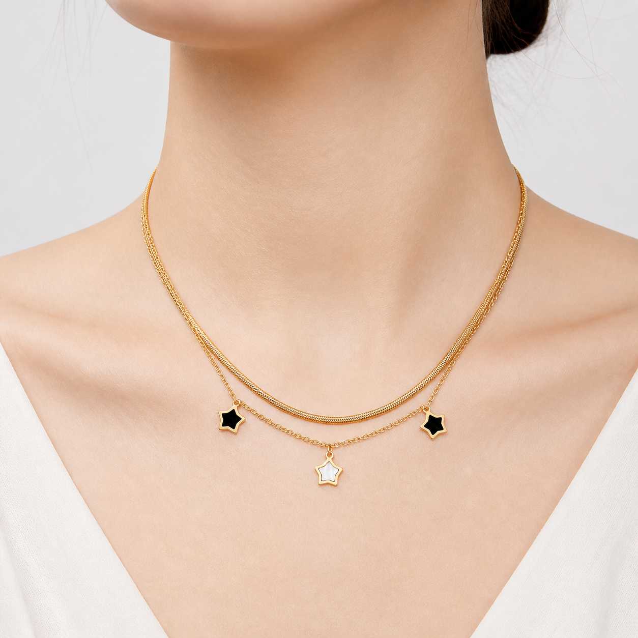 gold star charm layered necklace double chain design