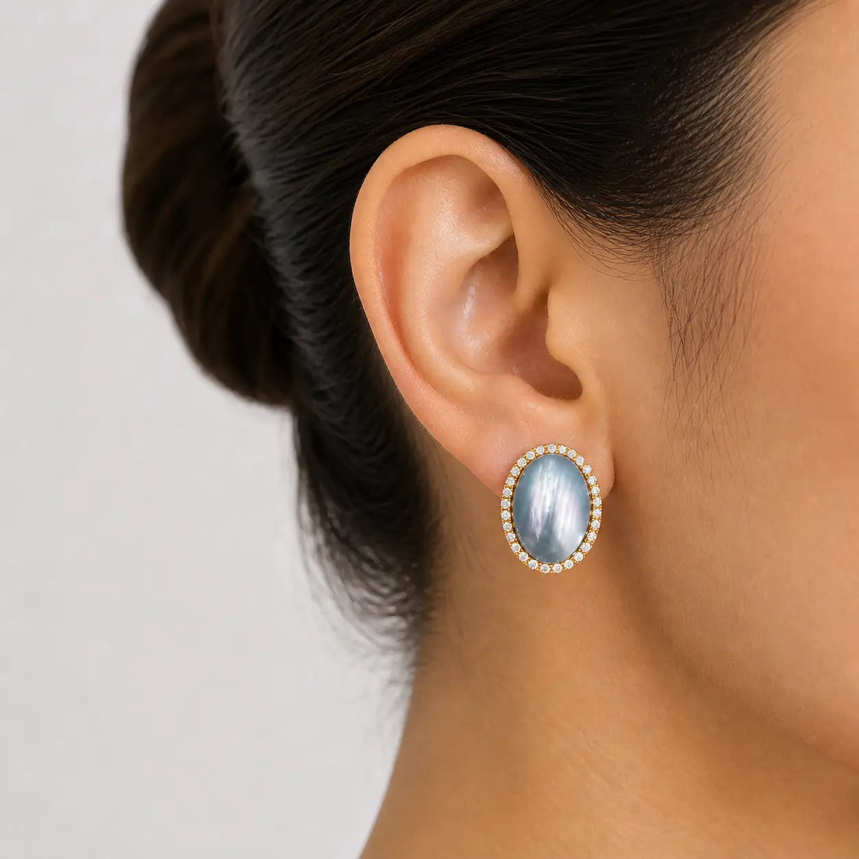 blue opal oval stud earrings gold crystal halo