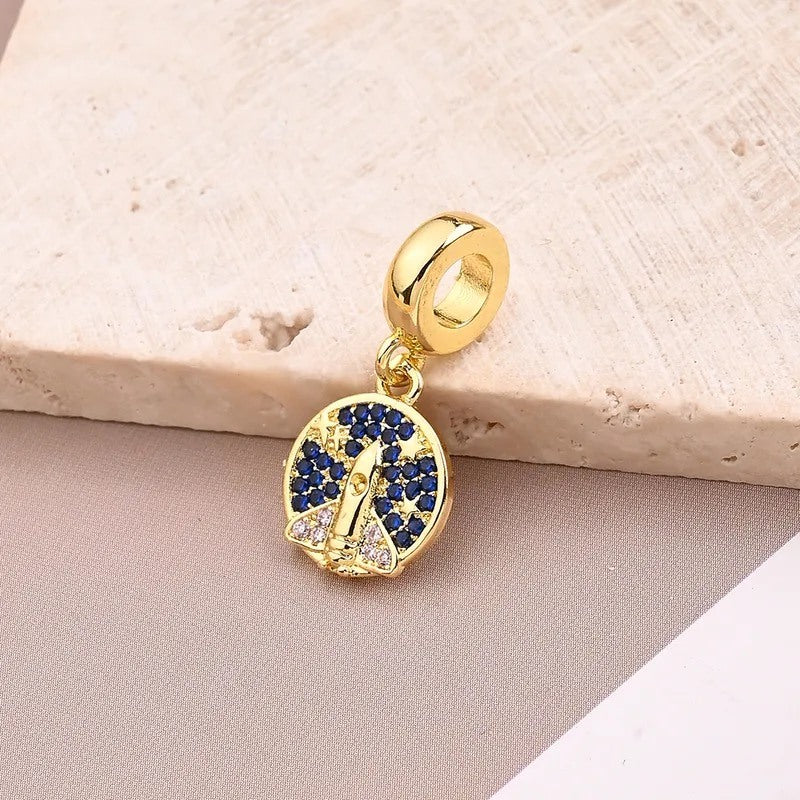 rocket charm pendant gold blue stone space design