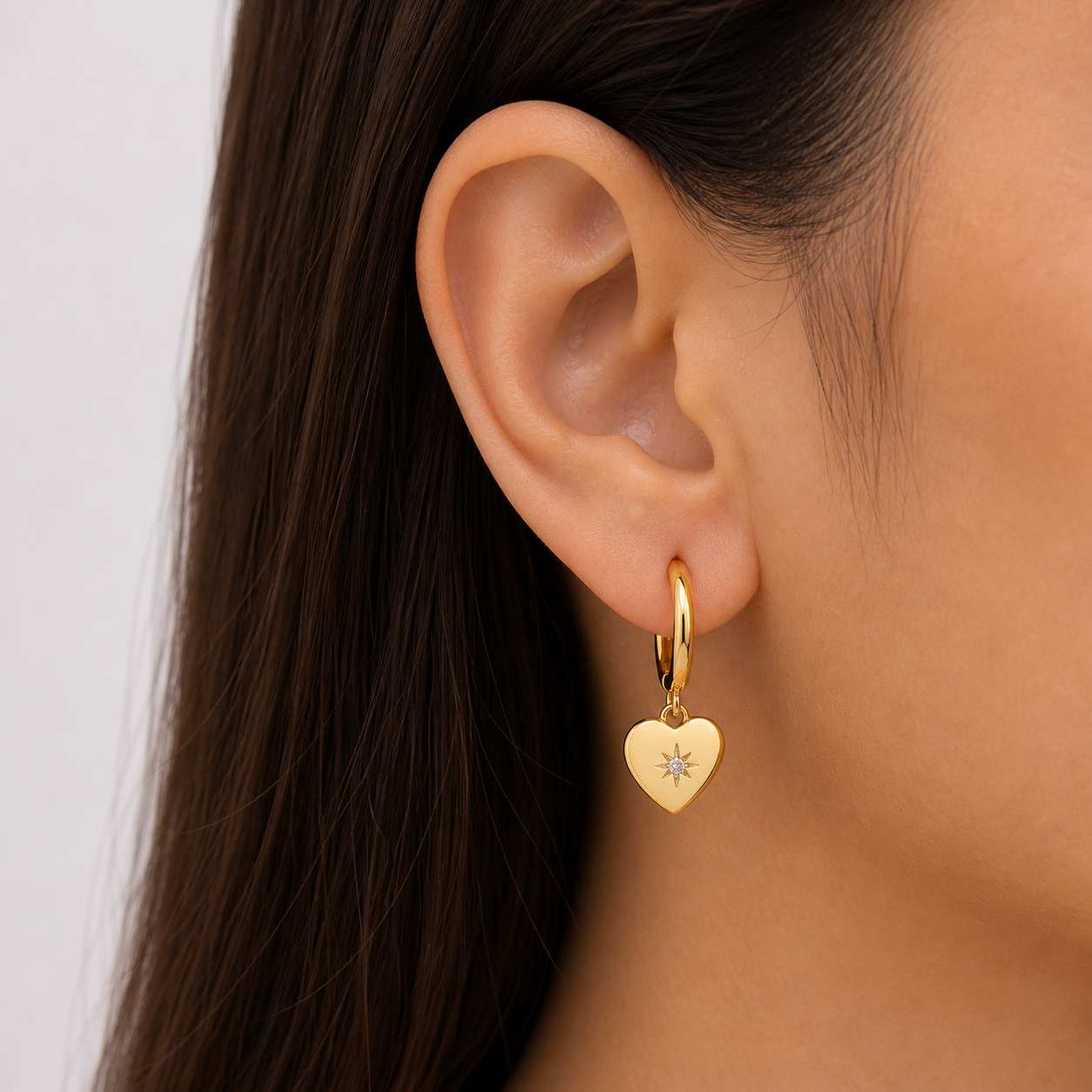 gold heart drop hoop earrings star detail charm