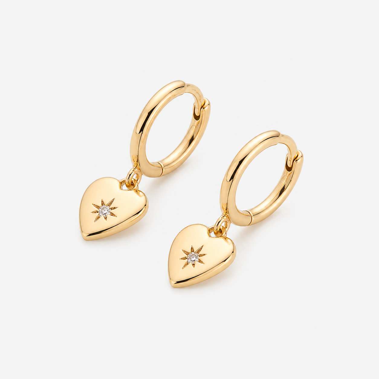 gold heart drop hoop earrings star detail charm
